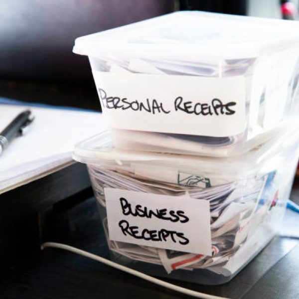 istockphoto-1244297246-612×612 DIY plastic containers with personal & business receipts authentic home office space.